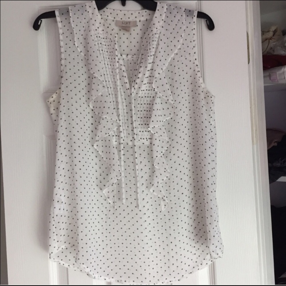 sleeveless sheer polka dot patterned blouse
